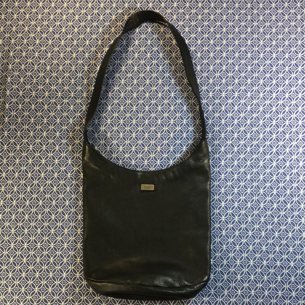 The Sak black leather purse - hobo bucket style.